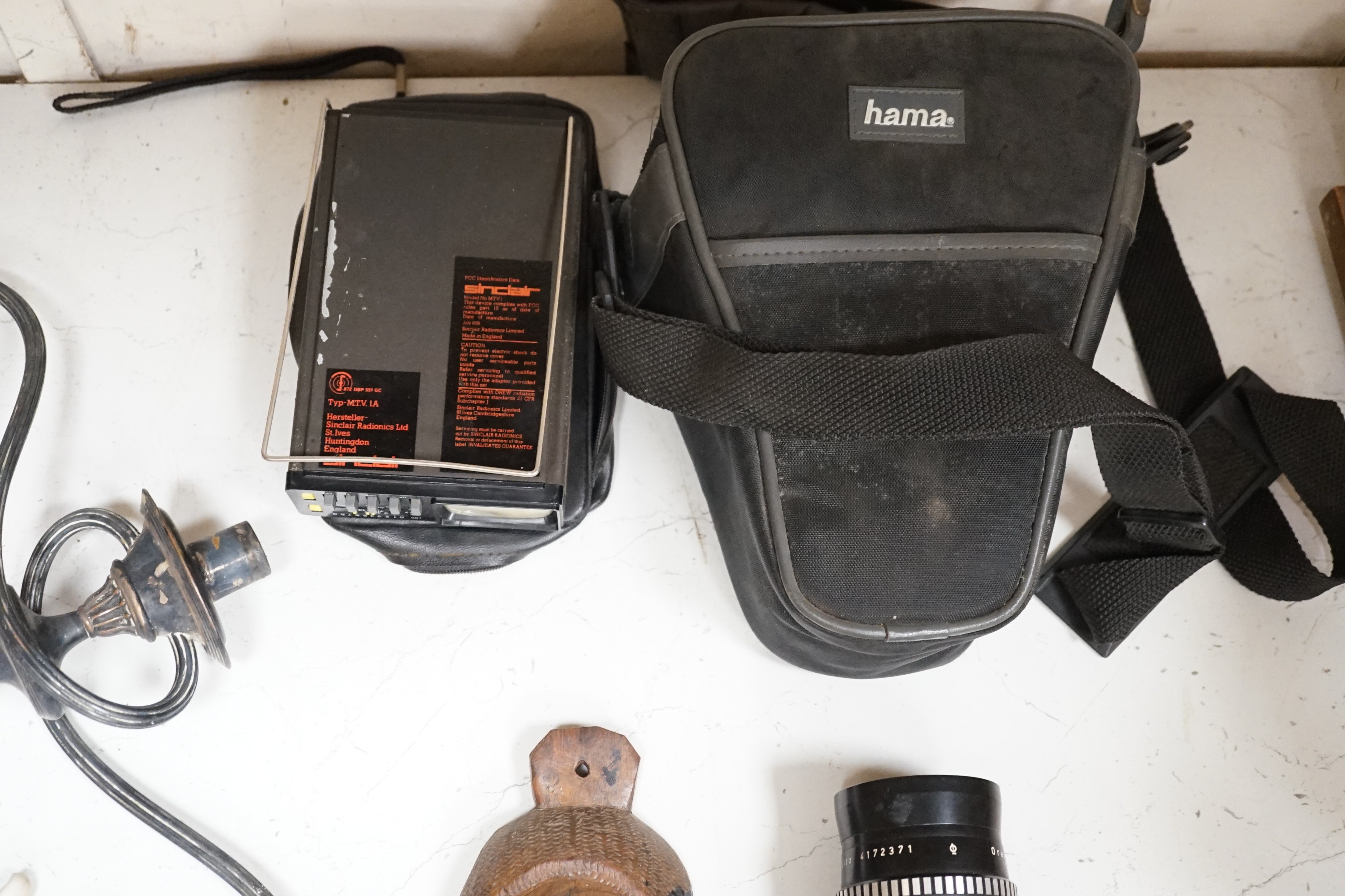 A Sinclair Micro Vision portable television, a Praktica SLR camera, etc.